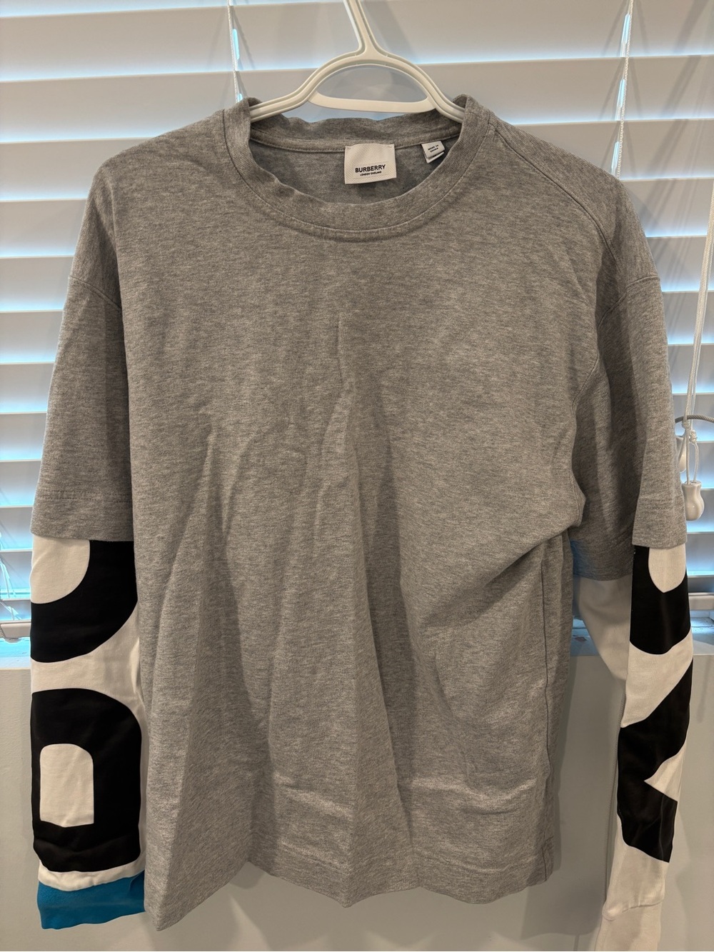Burberry Grey Long-Sleeve Tee with Black & White Graphic Sleeves and Blue Cuff